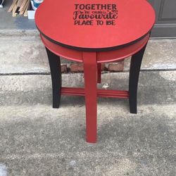 Refinished, black and red side table