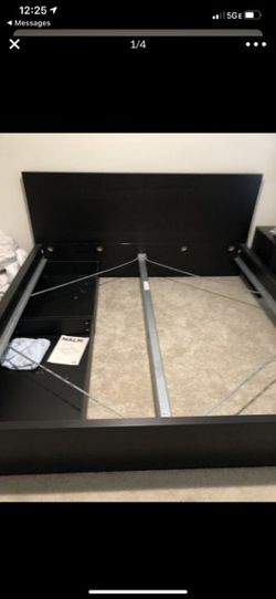 IKEA king size bed frame with two under drawers.