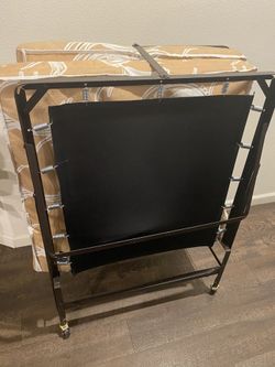 Folding twin bed