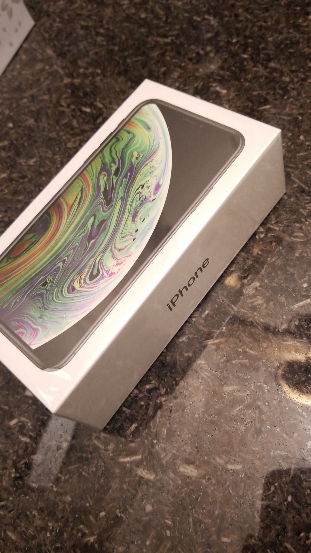 new iPhone xs, never opened , never used