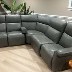 Grey Italian leather sectional five years old