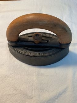 Antique iron with wooden handle