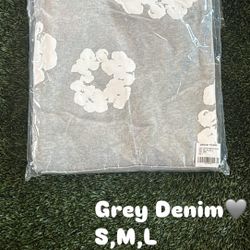 Grey denim tear 