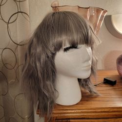 Grayish Color Wig. New. Medium Length. 