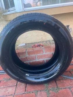 Brand new tire 235-60-18