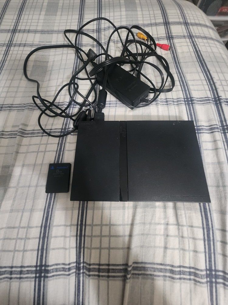 Sony Ps2 With Controllers Memory Card And Games