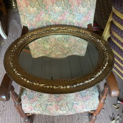 Beautiful mirror the frame is plasic it’s 22 by 26 inches 