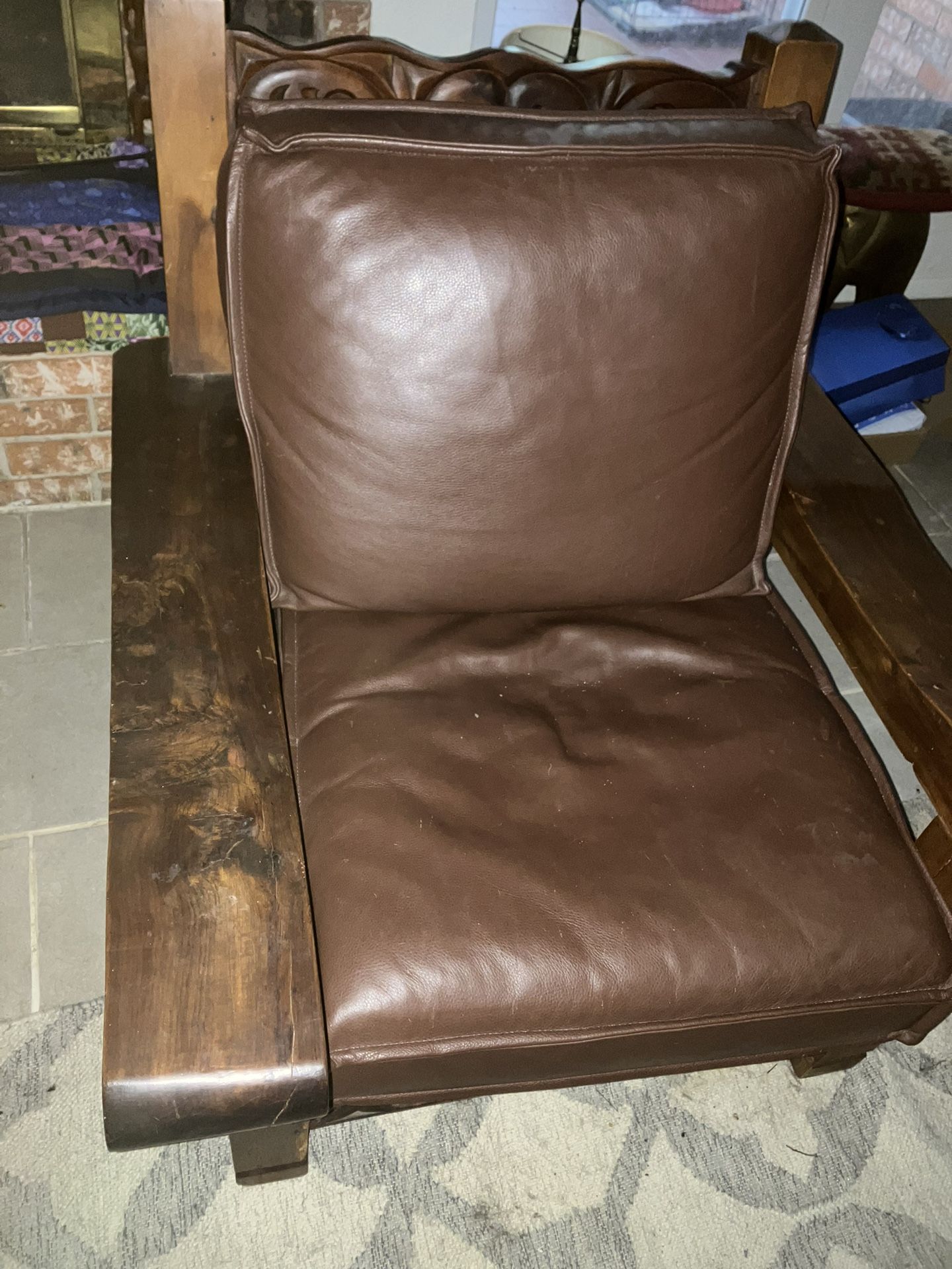 Two Solid Wood Chairs With Leather Cushions