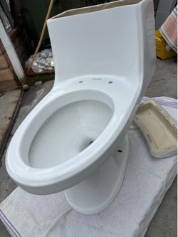 One pc glacier bay toilet white