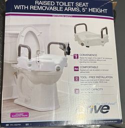 Raised toilet seat with removable arms