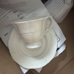 Cup and saucer set of 4 (used once)
