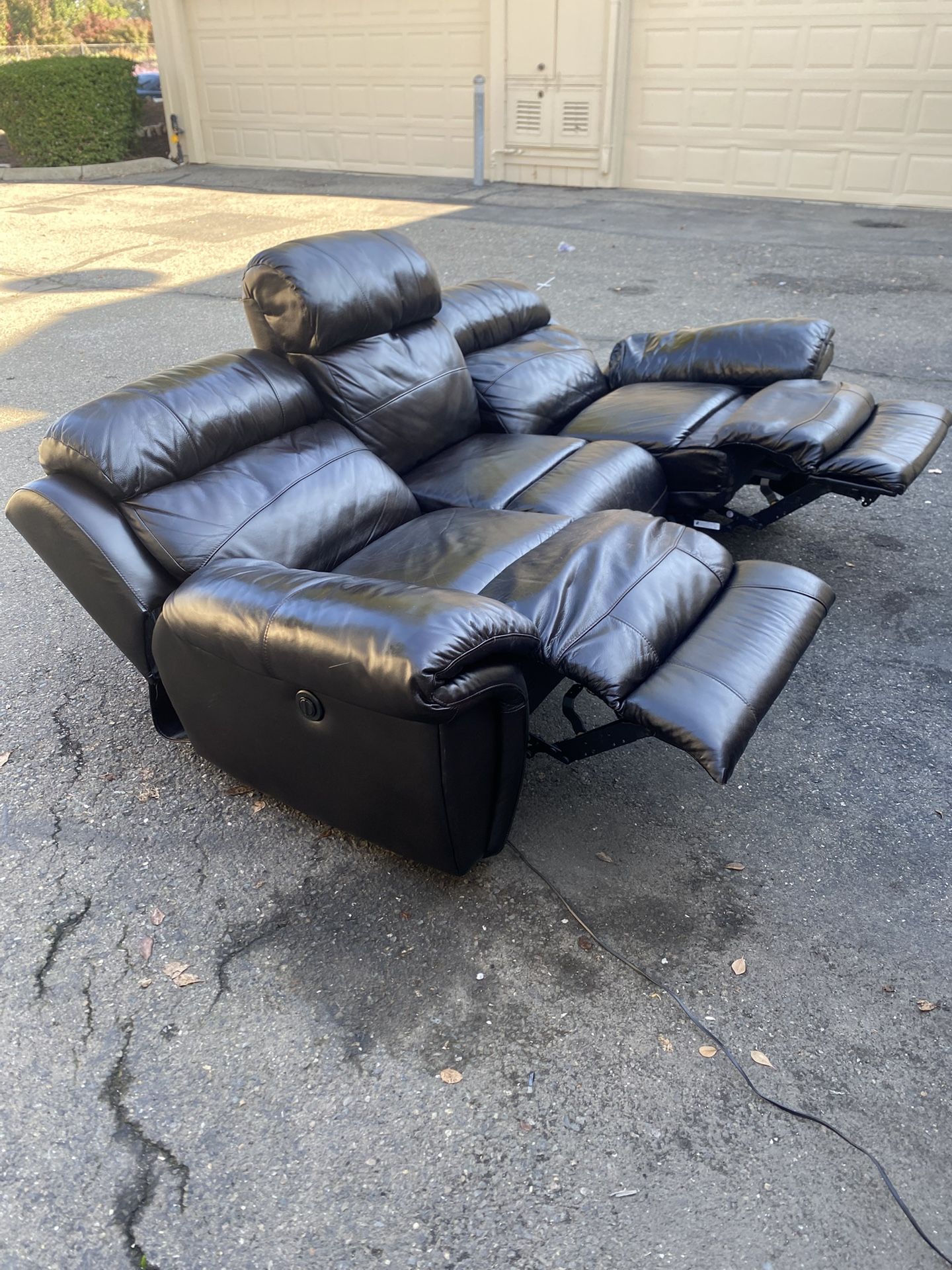 Free Delivery - Black Leather Electric Reclining Couch