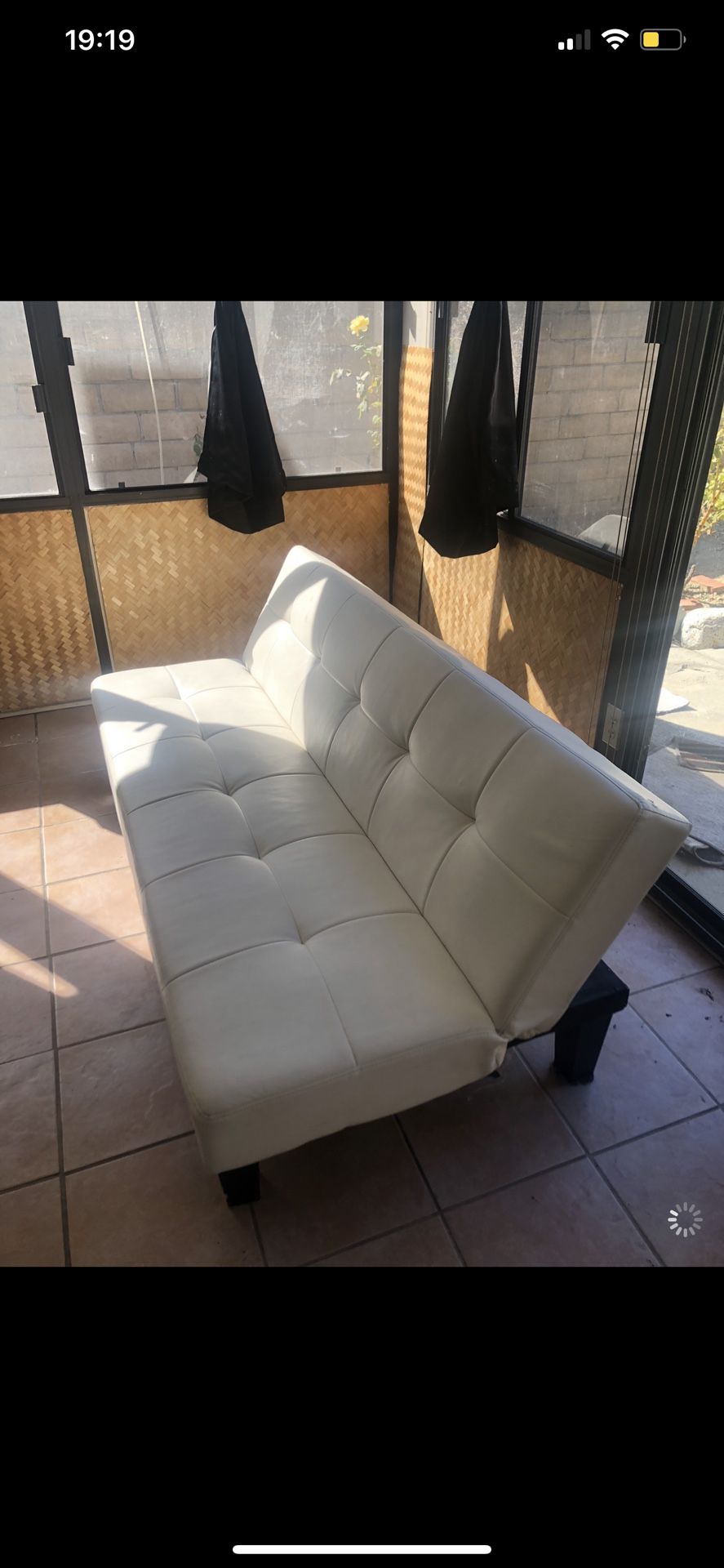 White futon leather couch
