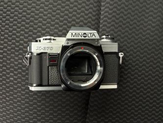 Minolta film camera with lens
