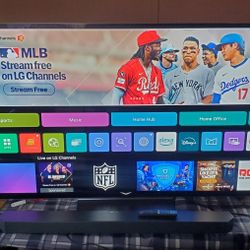 LG OLED evo C3 65 Inch Class 4K Smart TV 2023 with Samsung sound bar and remote 