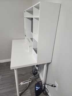 White Desk with Built-In Shelving Unit