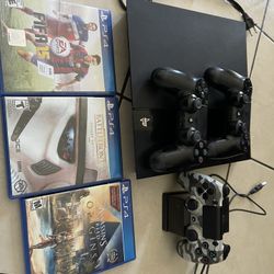 PS4 With 3 Controls And Games