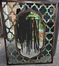Mirror featuring a quatrefoil lattice beautiful color frame