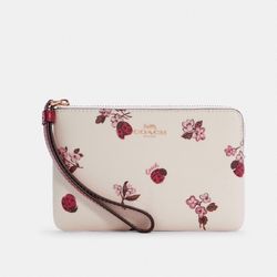 Coach wristlet Lady Bug And Floral Pattern