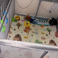 Baby play Yard Reversible mat. Already set up no need to take down.