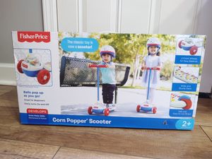 Photo Fisher Price Corn Popper Scooter