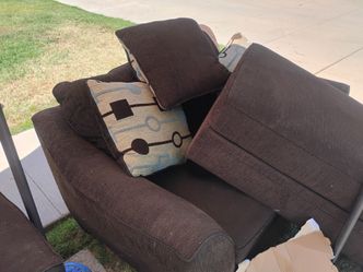 two overstuffed couches with full size ottomans