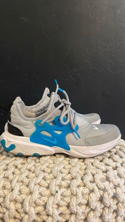 Size 4 big kids Nike grey shoes