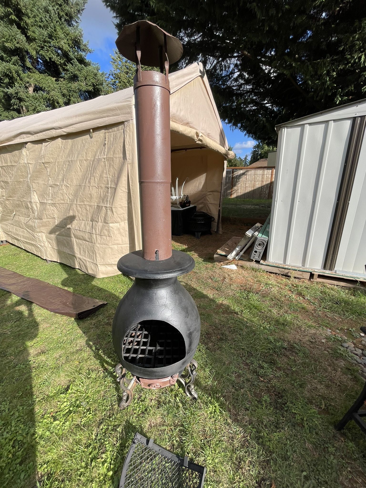 Heavy wrought iron wood-burning fireplace, in good condition