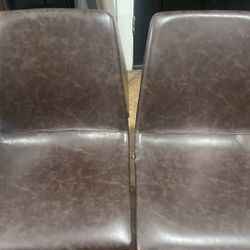 2 Brown Leather Chairs