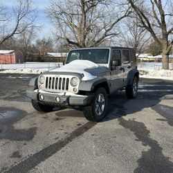 2014 Jeep Wrangler Unlimited Willys Wheeler Sport Utility.
