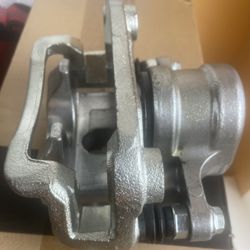 A Premium Disc Brake Caliper Assembly W/ Bracket 