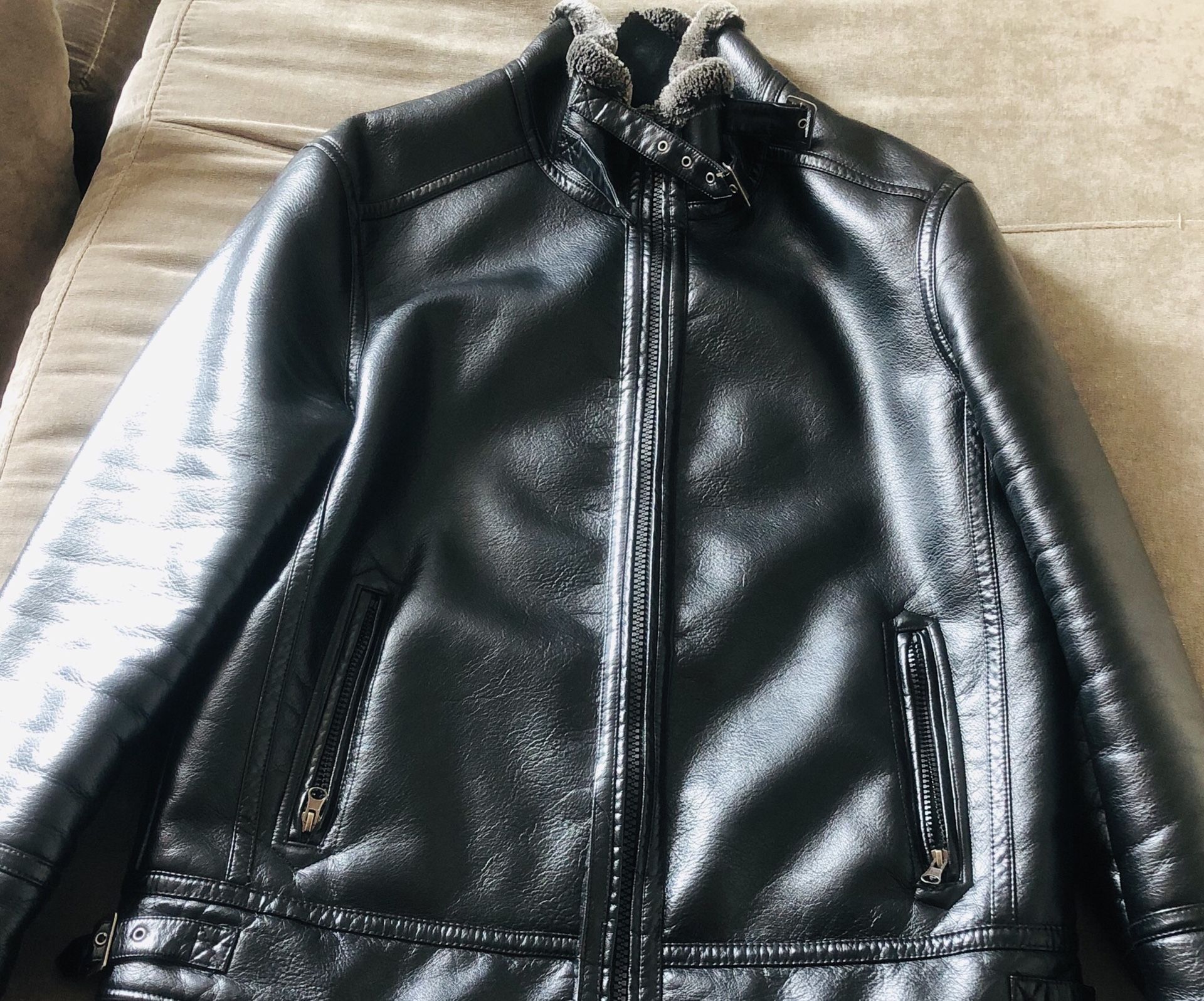 Winter Leather jacket used just for once and it’s M size with black color .