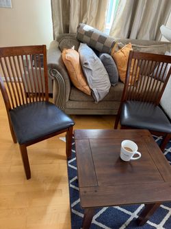 Selling the two Leather chairs