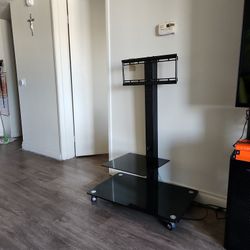Tv Stand and 55 Inch Samsung Tv