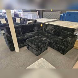 Comfortable soft Black corduroy sectional sofa with ottoman