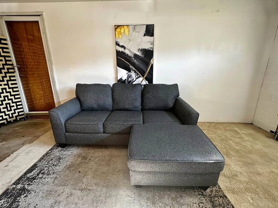 Gray 3-Seater Sectional Sofa with Ottoman and Pull-Out Bed