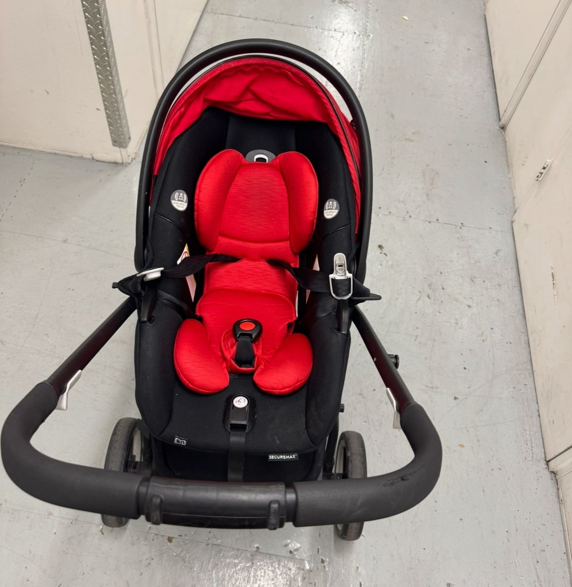 Red EvenFlo In Carseat Carriage Stroller