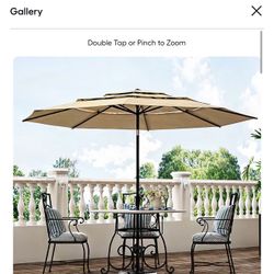 New in box Homsee Three-Tier Patio Umbrella with Crank Tilt Button and UV Protection No Base Included 11-ft L x 11-ft W x 8-ft H Light Khaki, 510007-0