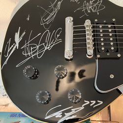 Underoath Autographed Kay Vintage Series Electric Guitar. This guitar was hand signed by all members of the band Underoath at record store 