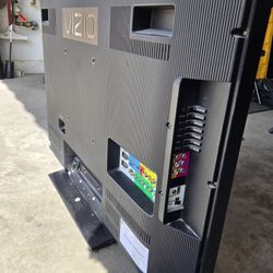 TV led by Vizio & exercise machine 