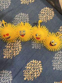 Lightup emojiface puffer squeeze ball stress reliever for kids and adult. (Each)