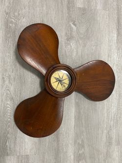 Wooden propeller clock