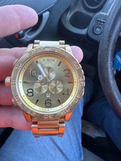 Nixon watch gold color