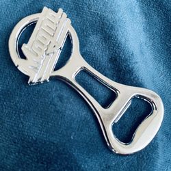 Vintage Magna Cigarettes promotional chrome bottle cap opener. 