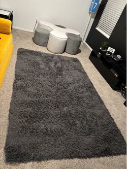 Dark grey shaggy fluffy rug
