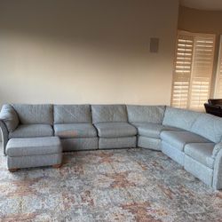 Sectional Sofa With Hide A Bed And End Recliner And Ottoman