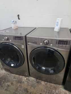LG SET STEAM WASHER AND GasDRYER STAINLESS STEEL