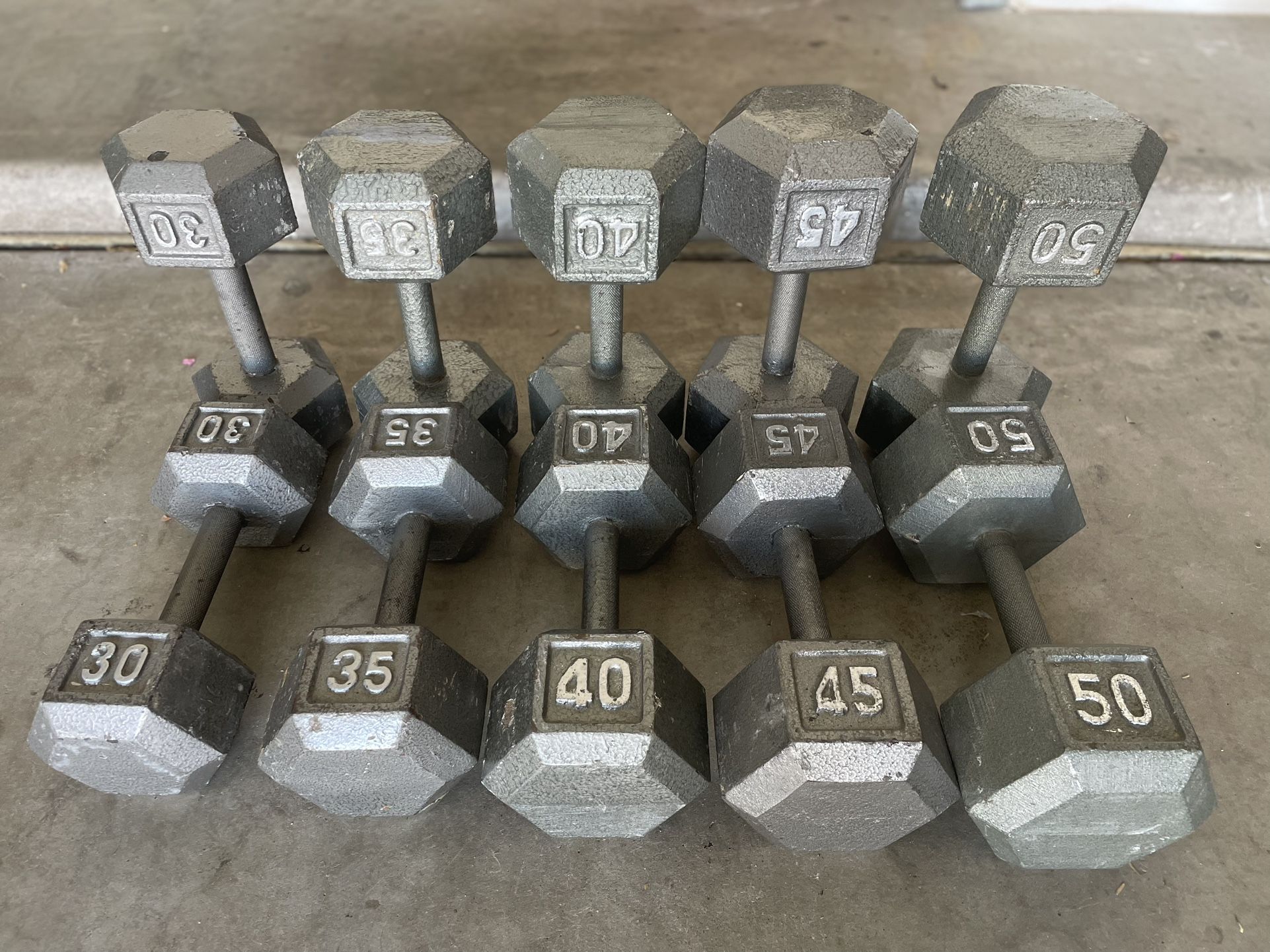 Iron dumbbell pairs: 30 + 35 + 40 + 45 + 50