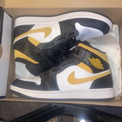 Black University Gold Jordan 1’s 