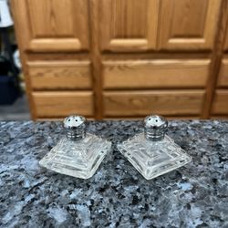 Vintage Glass Salt and Pepper Shakers Metal Cap. Preowned very good condition.
